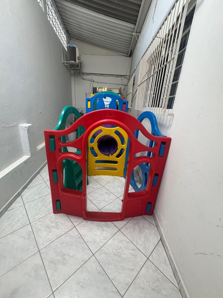 Brinquedo infantil no espaço kids do Elmo's Cabeleireiros